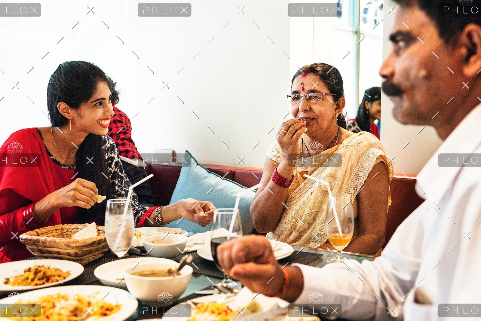 demo-attachment-41-family-having-indian-food-PU9L7XJ